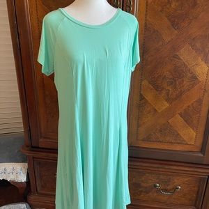 Ladies Jersey knit dress. Can be worn as casual dress. Knee length